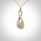Hand carved Single twist pendant with a little koru carved into the bottom. This pendant is carved from a lovely cream coloured bone. The artist is Yuri Terenyi. Bone art to wear by NZ Pacific.